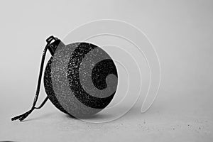 Small round glass plastic winter elegant decorative beautiful xmas festive Christmas ball, Christmas toy black white background