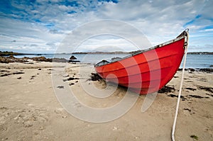 Small rowboat lying at shore