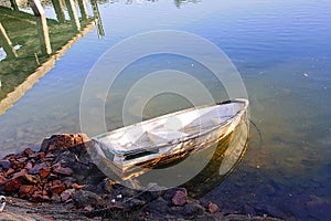 Small rowboat tinny at anchor