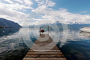 Small Rowing Boat Moored on Lake Geneva in Switzerland