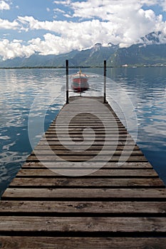 Small Rowing Boat Moored on Lake Geneva in Switzerland