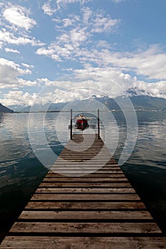 Small Rowing Boat Moored on Lake Geneva in Switzerland
