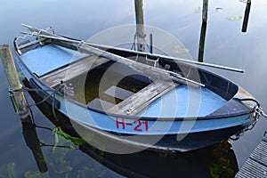 Small rowing boat in water