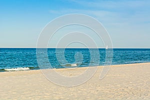 A small sailboat on the Baltic Sea at the summer