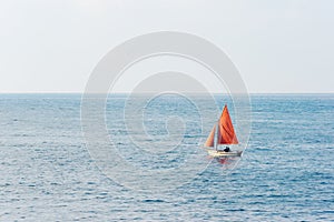 Small sailboat on water