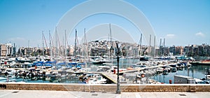 Small sailing boats and yachts docked at port of Piraeus, Greece