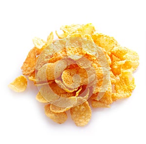 Small sampling of corn flakes in a pile