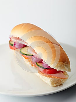 Small sandwich with deli meats and vegetables