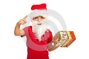 Small Santa Claus boy indicate