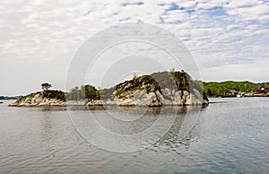 A small scenic island between Sokn and Mosteroy islands