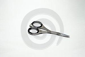 Small scissors with curved corners for manicure