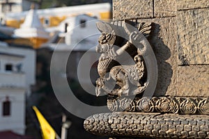 Small sculpture Garuda ornementing a temple