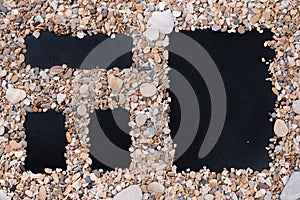 Small sea stones and shells with calendar, empty menu form with a free space under the text, title, ad, picture and date