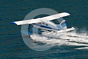 Small Seaplane Landing in Alaska