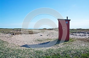 Small seaside toilet house