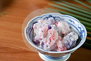 small season cake made of flour boiled in coconut milk sprinkled with shredded coconut "Krong Krang" Thai dessert