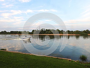 Small ship in river in evening, Lithuania