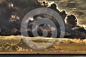 Small ship with threatening clouds, Vietnam photo