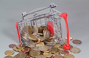 Small shopping cart and coins