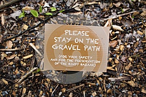 Small sign on gravel path on the Bindy bazaar trail in Bethel woods NY