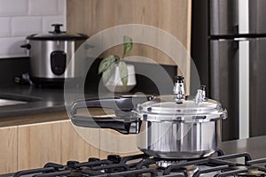 Small silver pressure cooker - Kitchen setting