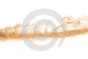 Small size fine Sand flying explosion, Golden grain wave explode. Abstract cloud fly. Yellow colored sand splash silica in Air.