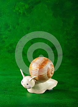 Small snail, green background