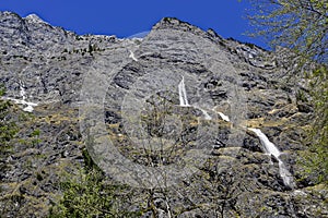 Small snow slip at mountain massif in spring