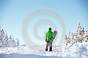 Small snowboarder snowboarding copyspace concept