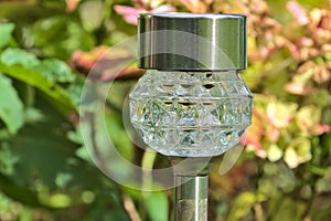 Small solar lantern in the garden
