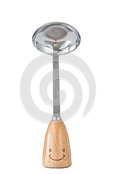 The small soup ladle with wooden handle and smile isolated on white background, kitchen utensil concept.