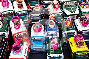 Small souvenir buses with load on a weekend market, Chichicastenango, Guatemala photo