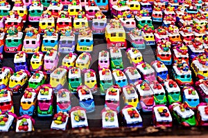 Small souvenir cars for sale on the market, Chichicastenango, Guatemala photo