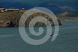 Small speedboat near shore of Baikal lake