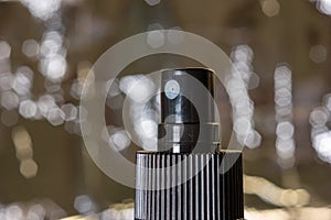 Small spray bottle pulverizer nozzle macro close up shot shallow depth of field