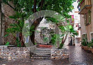 Small square in old town of Antibes, French Riviera, Provence, France