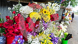 Small stall selling natural flowers on a road to Jinotega, Nicaragua, Central America, Latin America photo