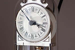 Small standing clock showing countdown time photo