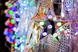 Small starlights and other LED Christmas string lights for sale at a department store