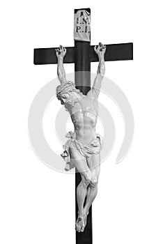 A small statue of Jesus Christ on the Cross isolated photo with clipping path