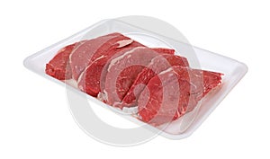 Small steaks on white meat tray