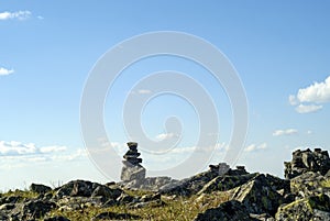 Small stone pyramid on a mountain plateau