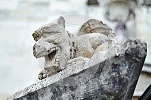 Small stone sculpture. Chimera gargoyle, dragon or bat