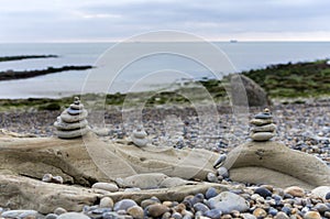 Small stone structures on the beach