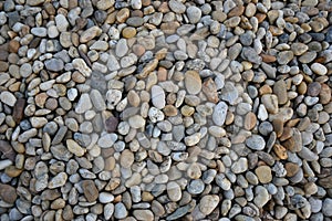 Small stones gravel texture. Naturally pebble textured background. Garden decor