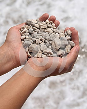 Small stones in hands