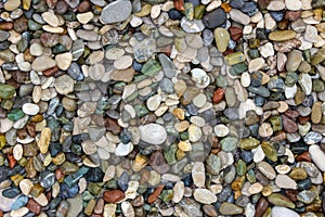 Small stones on  pebble beach, background