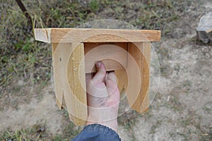 Small stool made of pine wood