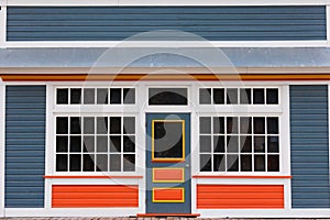 Small store front entrance colorful wooden house