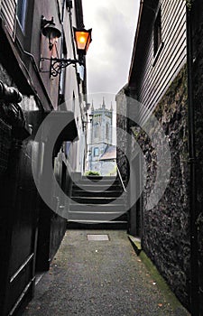 Small street with some steps in Kilkenny downtown, Ireland